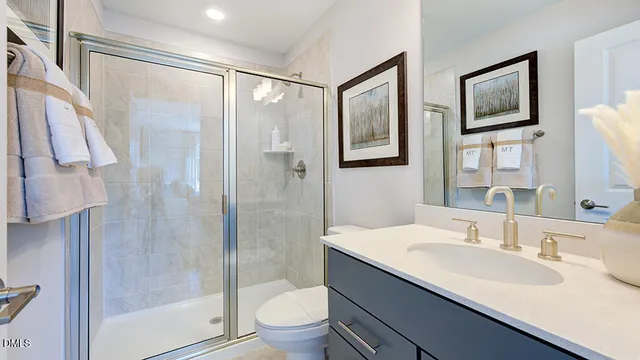 swimming pool view with a seating space and a garden view
