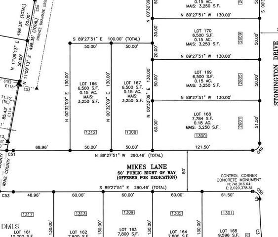 a kitchen with stainless steel appliances kitchen island granite countertop a table chairs and a refrigerator