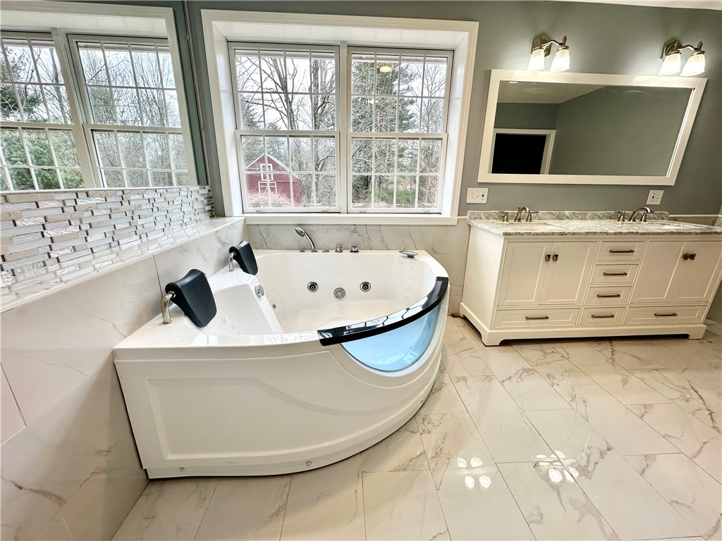 20 Biscuit Hill Road Foster, RI 02825 - Photo 17 of 48 Primary suite features a bathroom with 2 person jetted hot tub