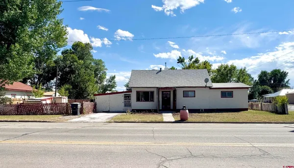 a view of a house with a patio