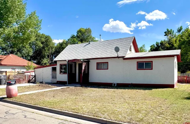 a house view with a garden space