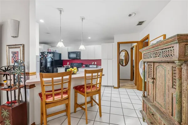 $525,000 | 4936 Mineola Place, Palm Harbor, FL 34684