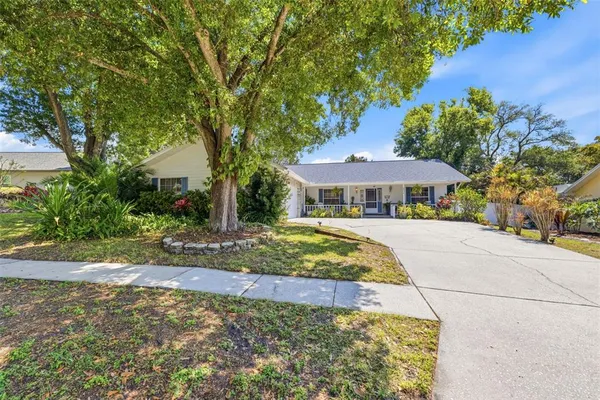 $525,000 | 4936 Mineola Place, Palm Harbor, FL 34684