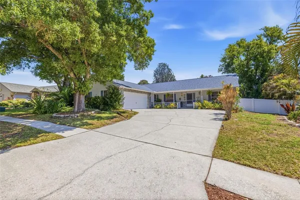 $525,000 | 4936 Mineola Place, Palm Harbor, FL 34684