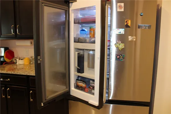 a picture of a bathroom with glass door