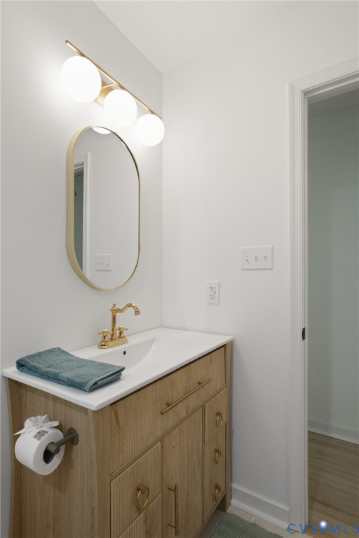 3056 Davis Mill Road Goochland, VA 23063 - Photo 35 of 46 Bathroom vanity featuring a light wood-finish cabi