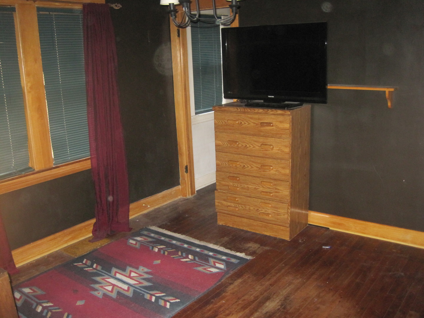 297 Olmsted Road Riverside, IL 60546 - Photo 12 of 15 a view of a hallway with wooden floor and cabinet