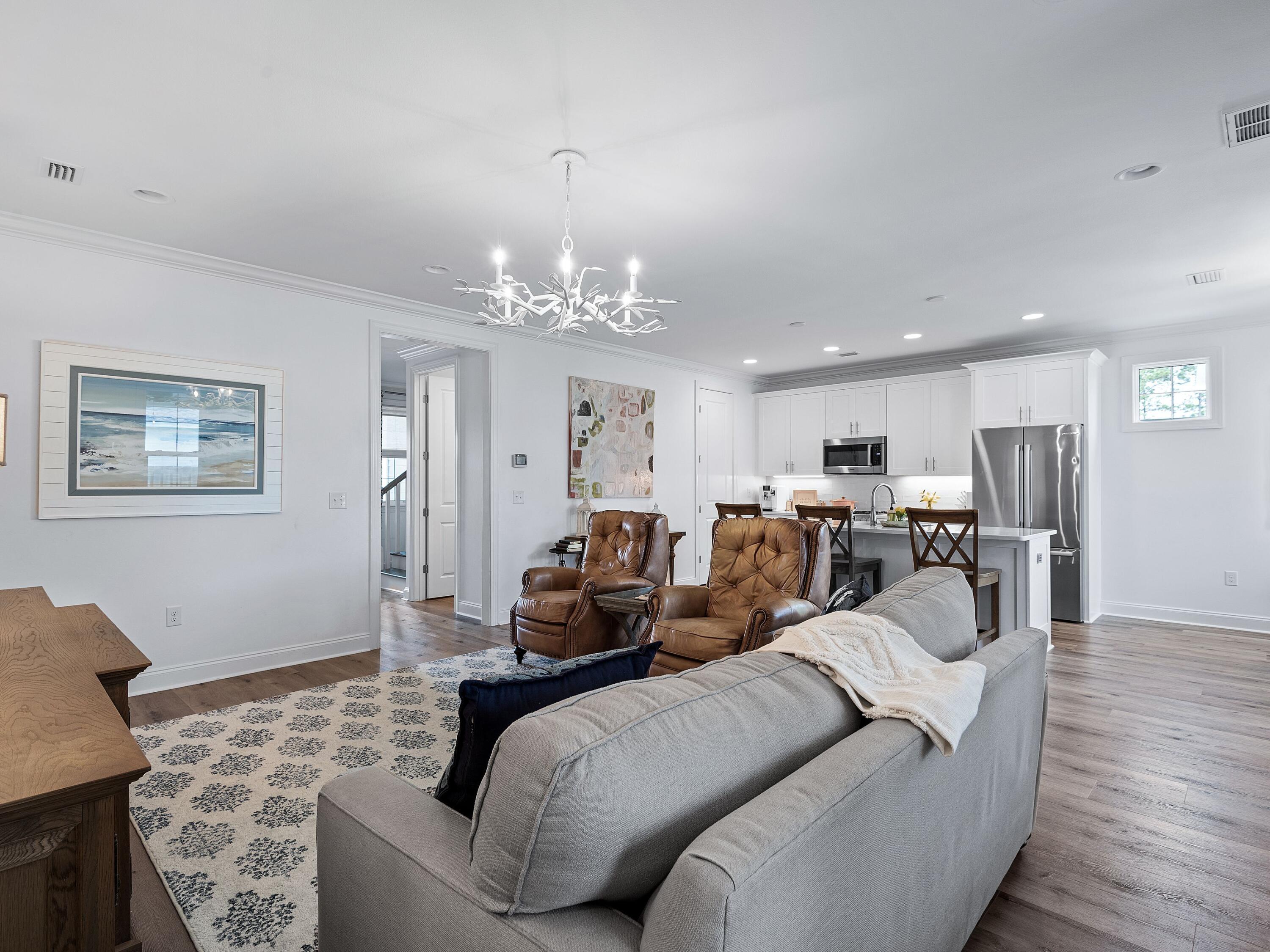 7 Cambium Ct Inlet Beach Inlet Beach, FL 32461 - Photo 21 of 50 a living room with furniture and a chandelier