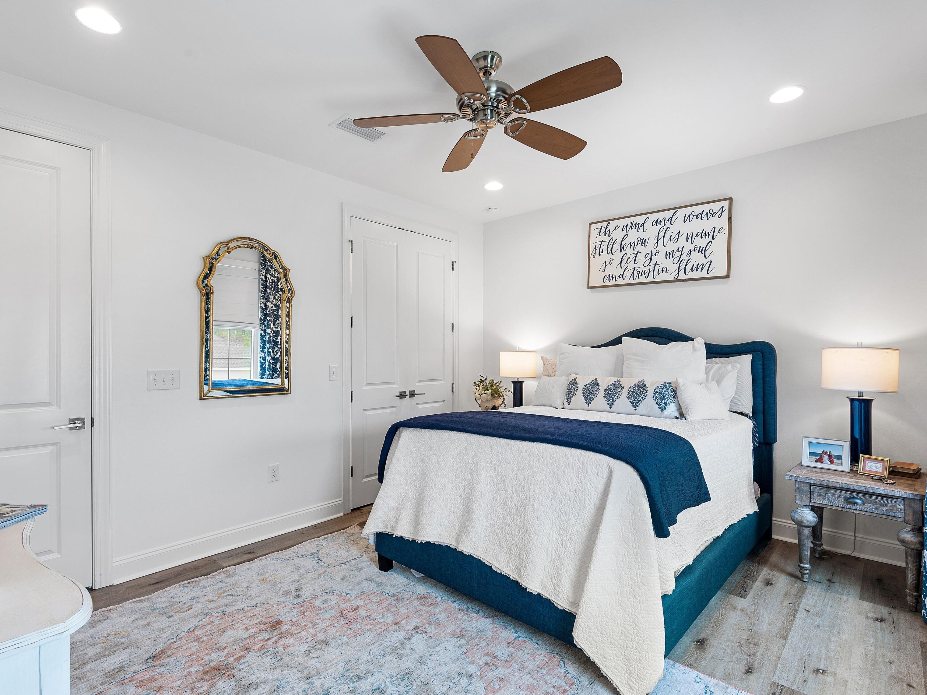 7 Cambium Ct Inlet Beach Inlet Beach, FL 32461 - Photo 29 of 50 a spacious bedroom with a bed and a ceiling fan