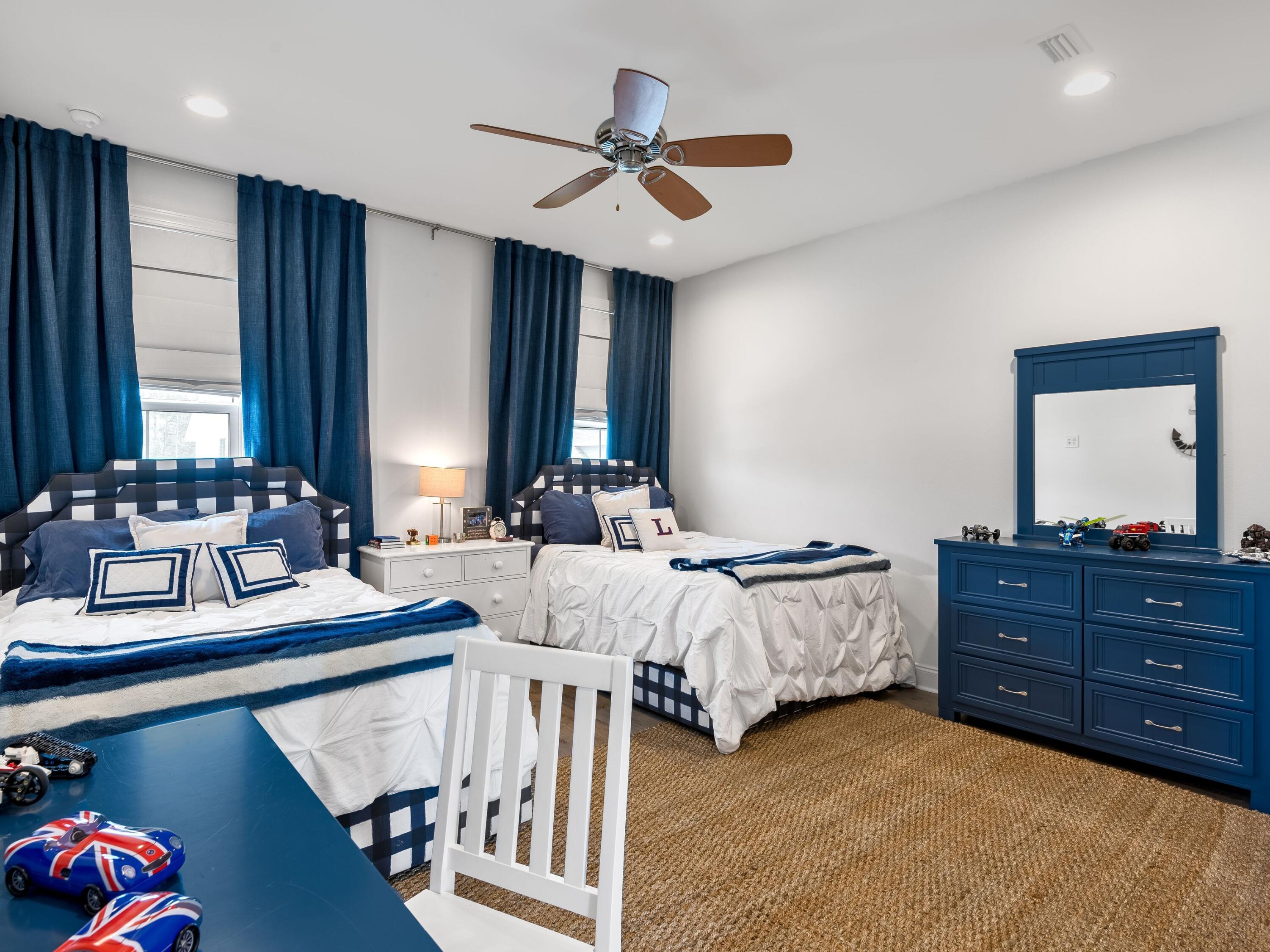 7 Cambium Ct Inlet Beach Inlet Beach, FL 32461 - Photo 32 of 50 a bed room with two bed and a dresser