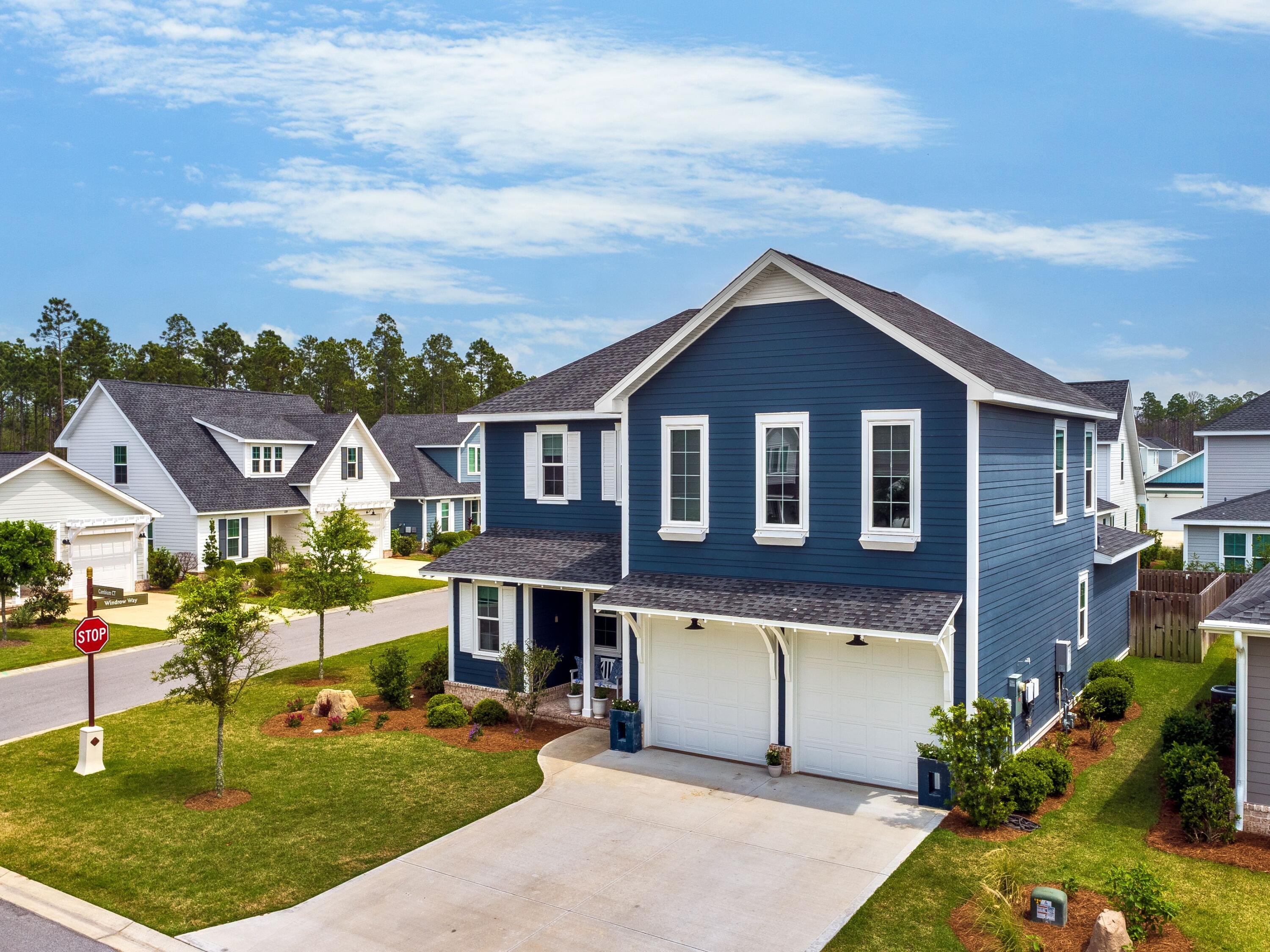 7 Cambium Ct Inlet Beach Inlet Beach, FL 32461 - Photo 36 of 50 a front view of a house with a yard