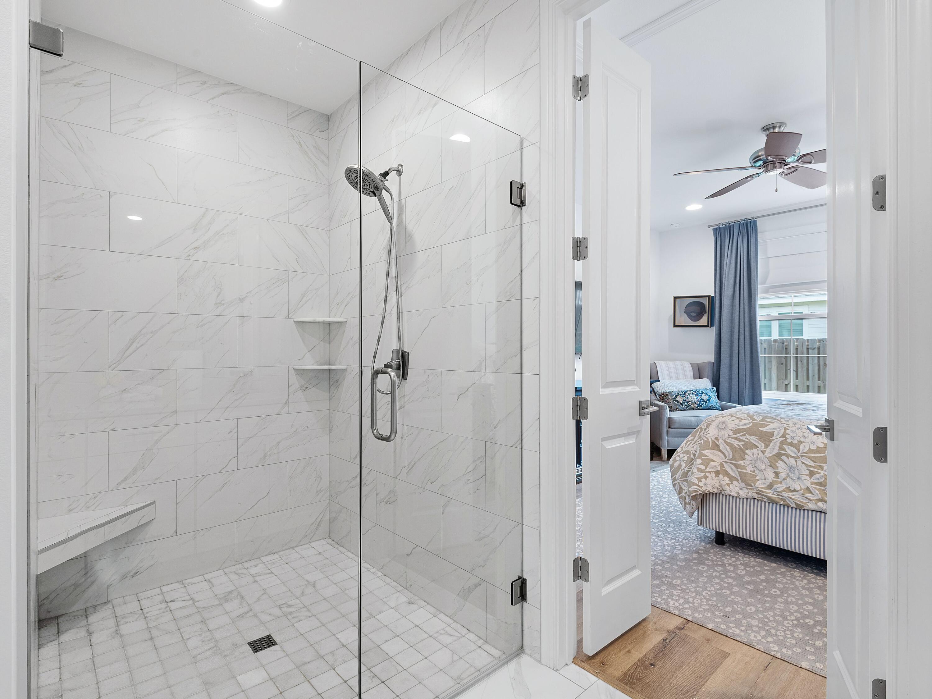 7 Cambium Ct Inlet Beach Inlet Beach, FL 32461 - Photo 7 of 50 a bathroom with a granite countertop shower a sink and a mirror