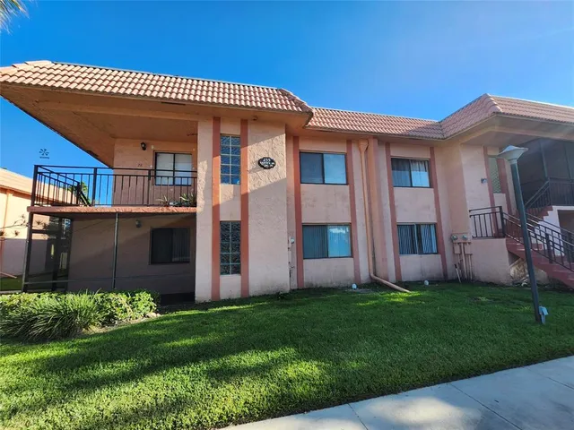 a front view of house with yard