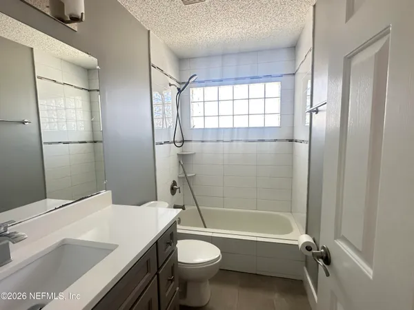 a view of a room with a window