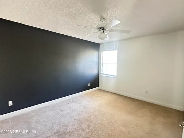 a view of a livingroom with a staircase