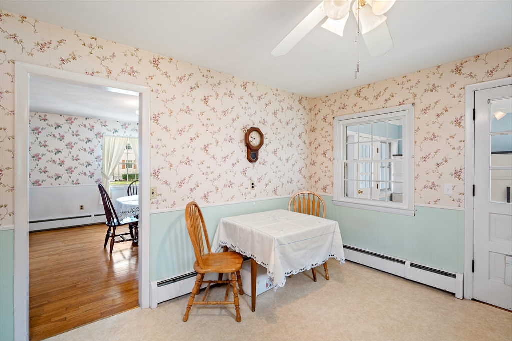 7 Stephen Drive Webster, MA 01570 - Photo 11 of 38 a view of a dining room with furniture and wooden floor