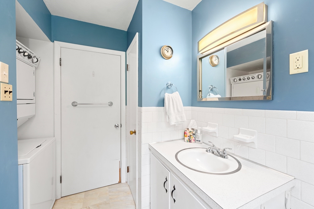7 Stephen Drive Webster, MA 01570 - Photo 17 of 38 a bathroom with a sink vanity and a mirror