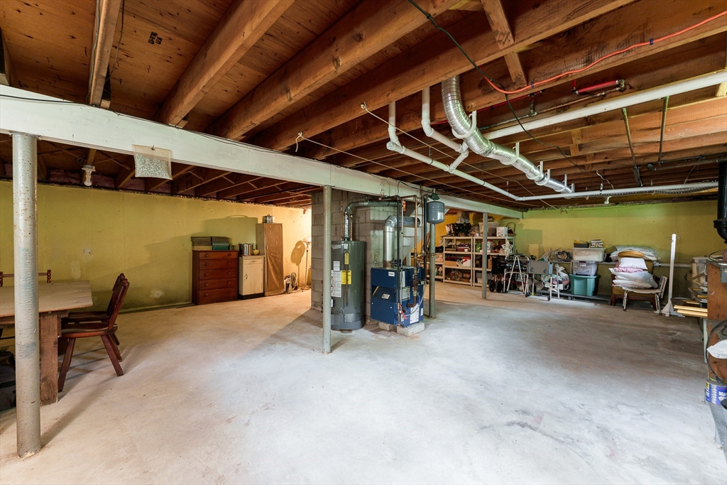 7 Stephen Drive Webster, MA 01570 - Photo 27 of 38 a view of a big room with air conditioner duct and materials on floor
