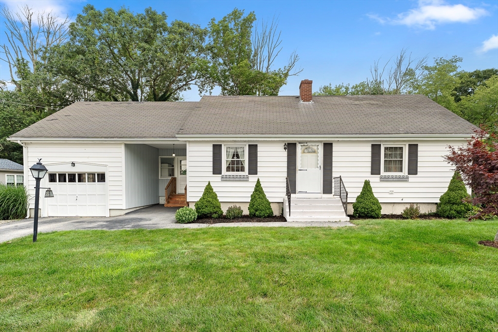 7 Stephen Drive Webster, MA 01570 - Photo 31 of 38 a front view of house with yard and green space