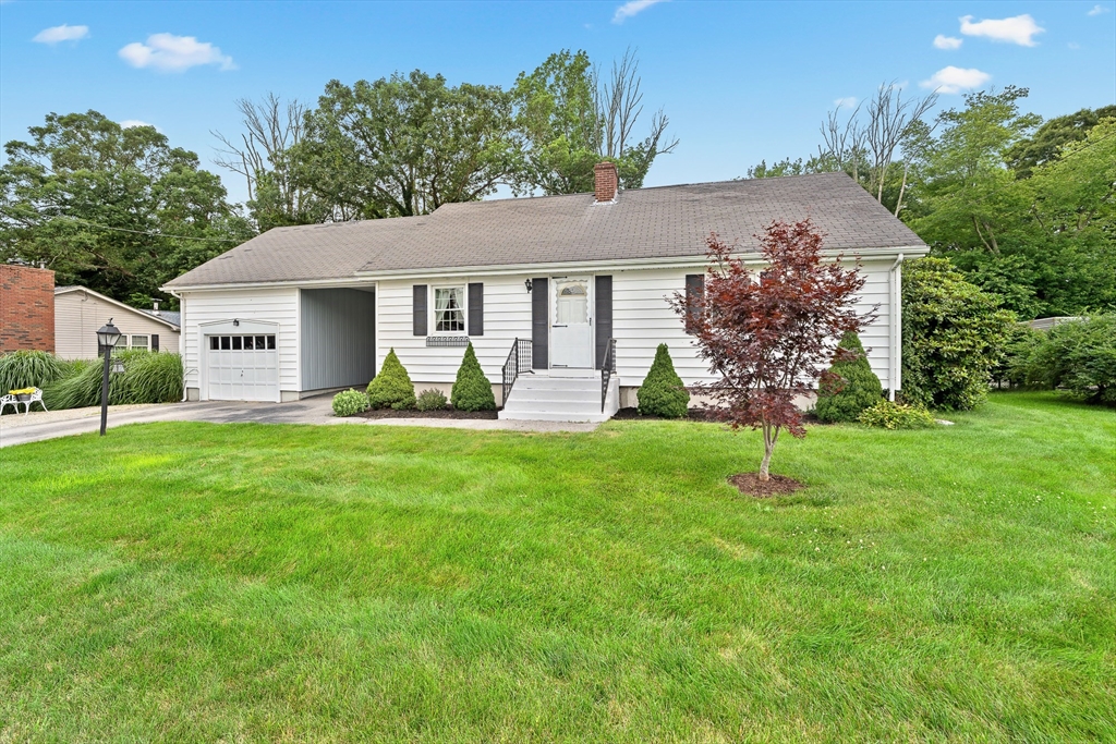 7 Stephen Drive Webster, MA 01570 - Photo 32 of 38 a front view of house with yard and green space