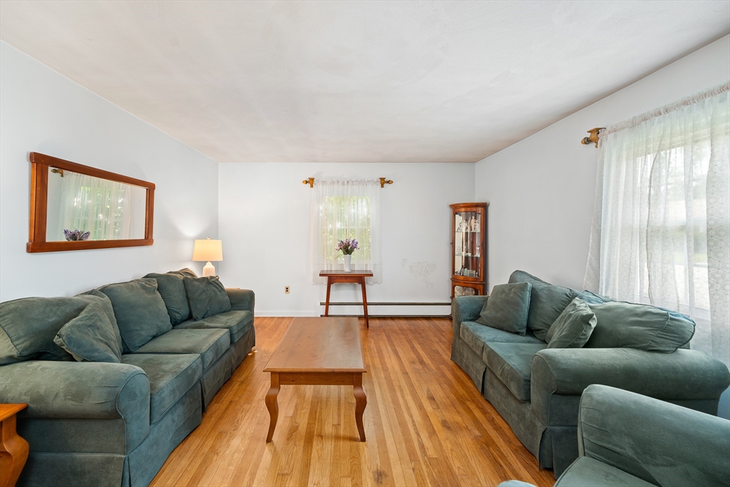 7 Stephen Drive Webster, MA 01570 - Photo 6 of 38 a living room with furniture and a couch