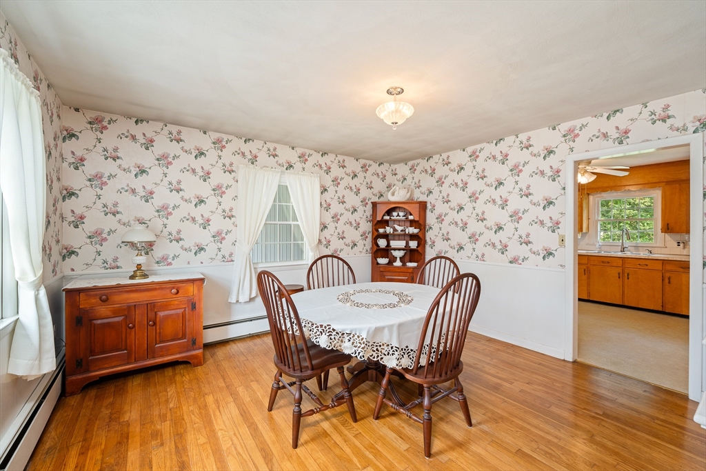 7 Stephen Drive Webster, MA 01570 - Photo 9 of 38 a view of a dining room with furniture and wooden floor