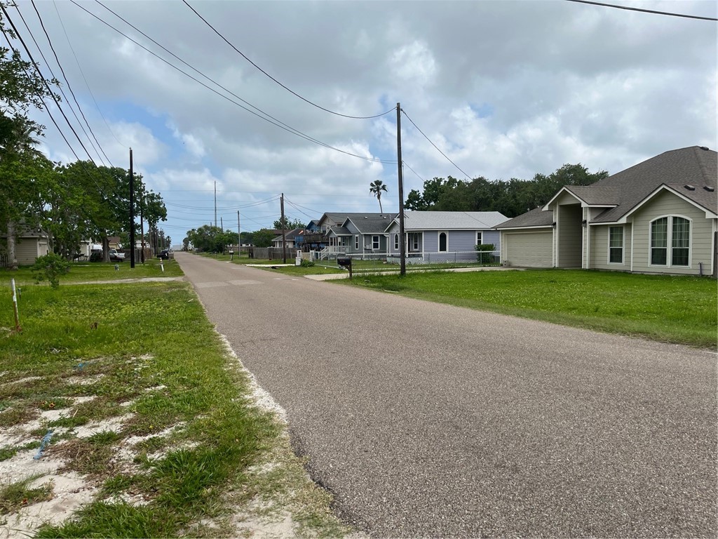 450 Skipper Lane Corpus Christi, TX 78418 - Photo 26 of 26 a view of a house with a yard and table