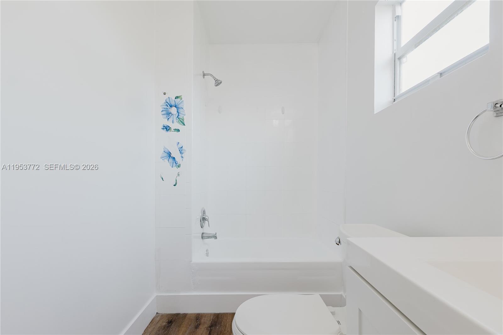 4338 Northwest 24th Avenue Miami, FL 33142 - Photo 19 of 26 a bathroom with a toilet and a shower