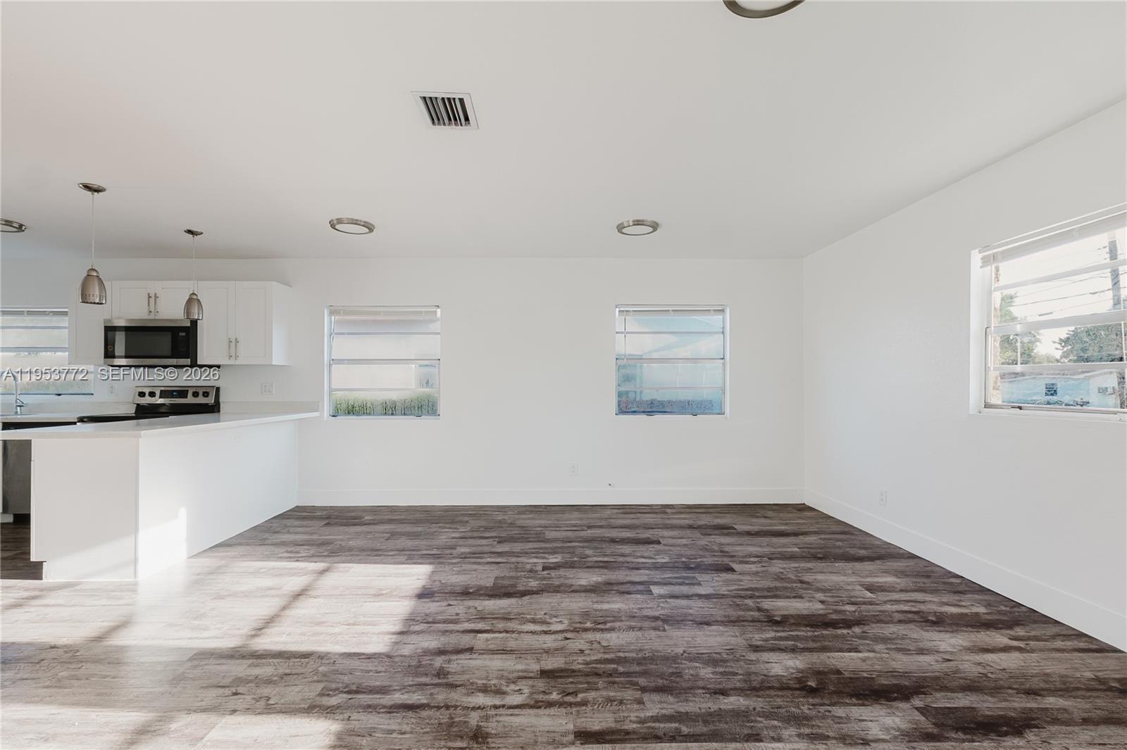 4338 Northwest 24th Avenue Miami, FL 33142 - Photo 6 of 26 a view of kitchen with window