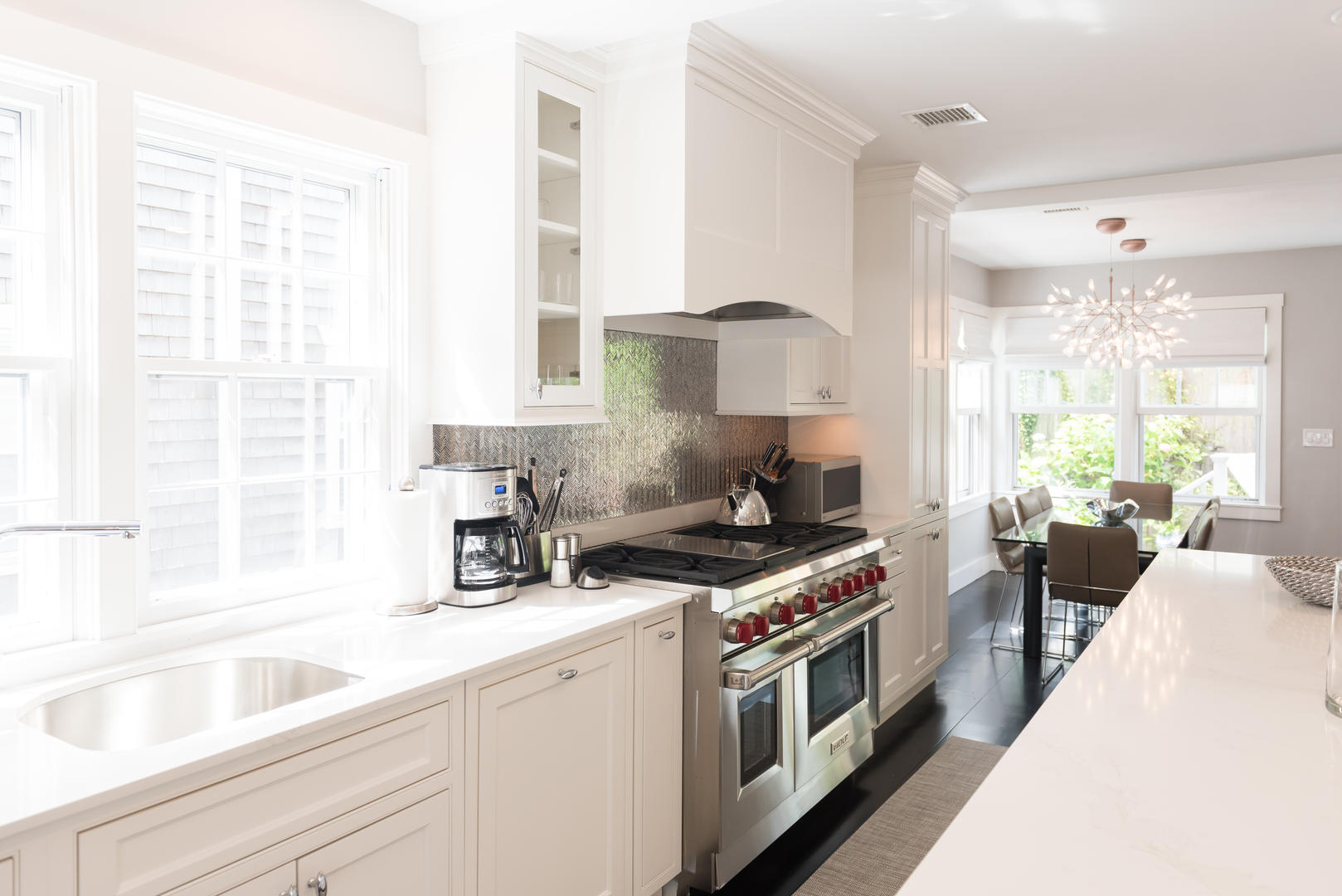 59 Orange Street Nantucket, MA 02554 - Photo 41 of 42 a kitchen that has a sink and a stove