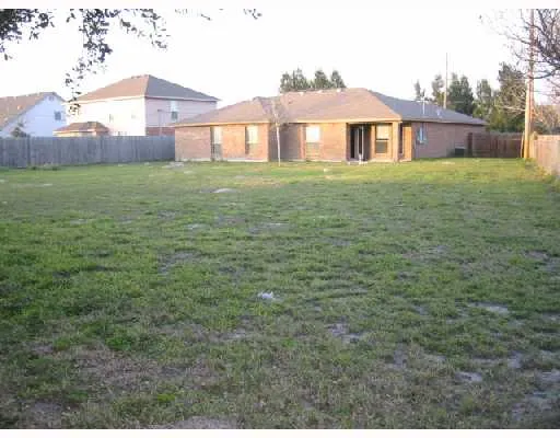 a house view with garden space