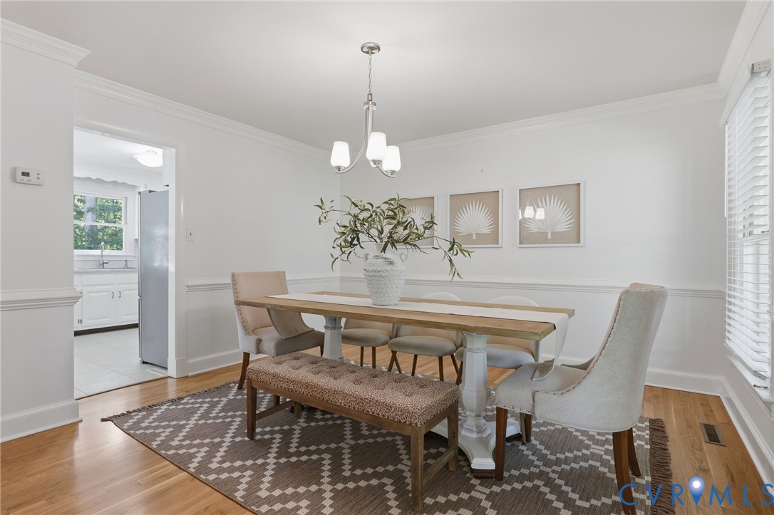 2311 Castle Hill Road Midlothian, VA 23113 - Photo 17 of 39 Hardwood-finish flooring, crown molding, chair rai