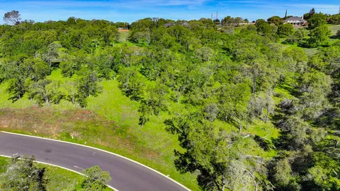 a view of a lake with a yard