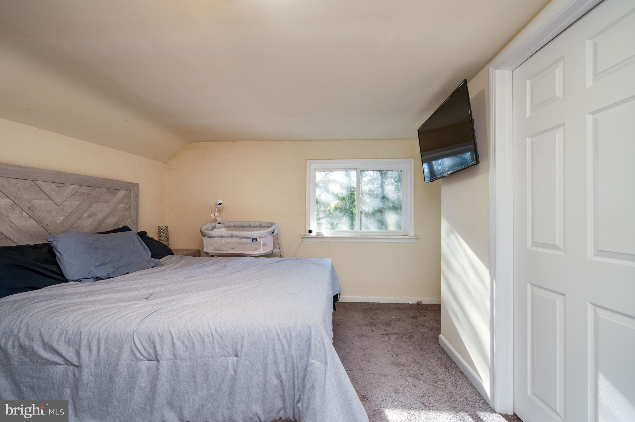 175 Forgedale Road Fleetwood, PA 19522 - Photo 19 of 42 a bedroom with a bed and a flat tv screen on dresser