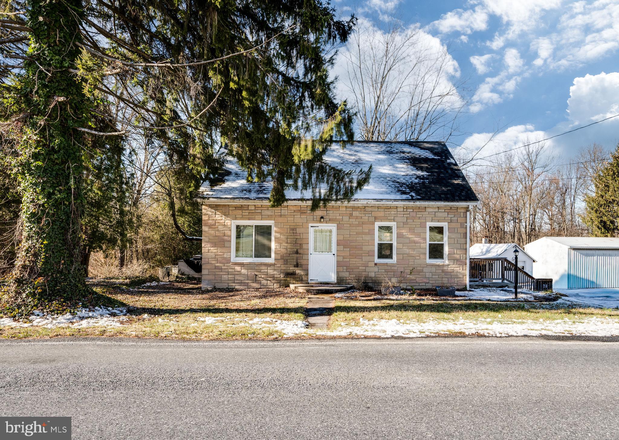 175 Forgedale Road Fleetwood, PA 19522 - Photo 2 of 42 a front view of a house with a yard