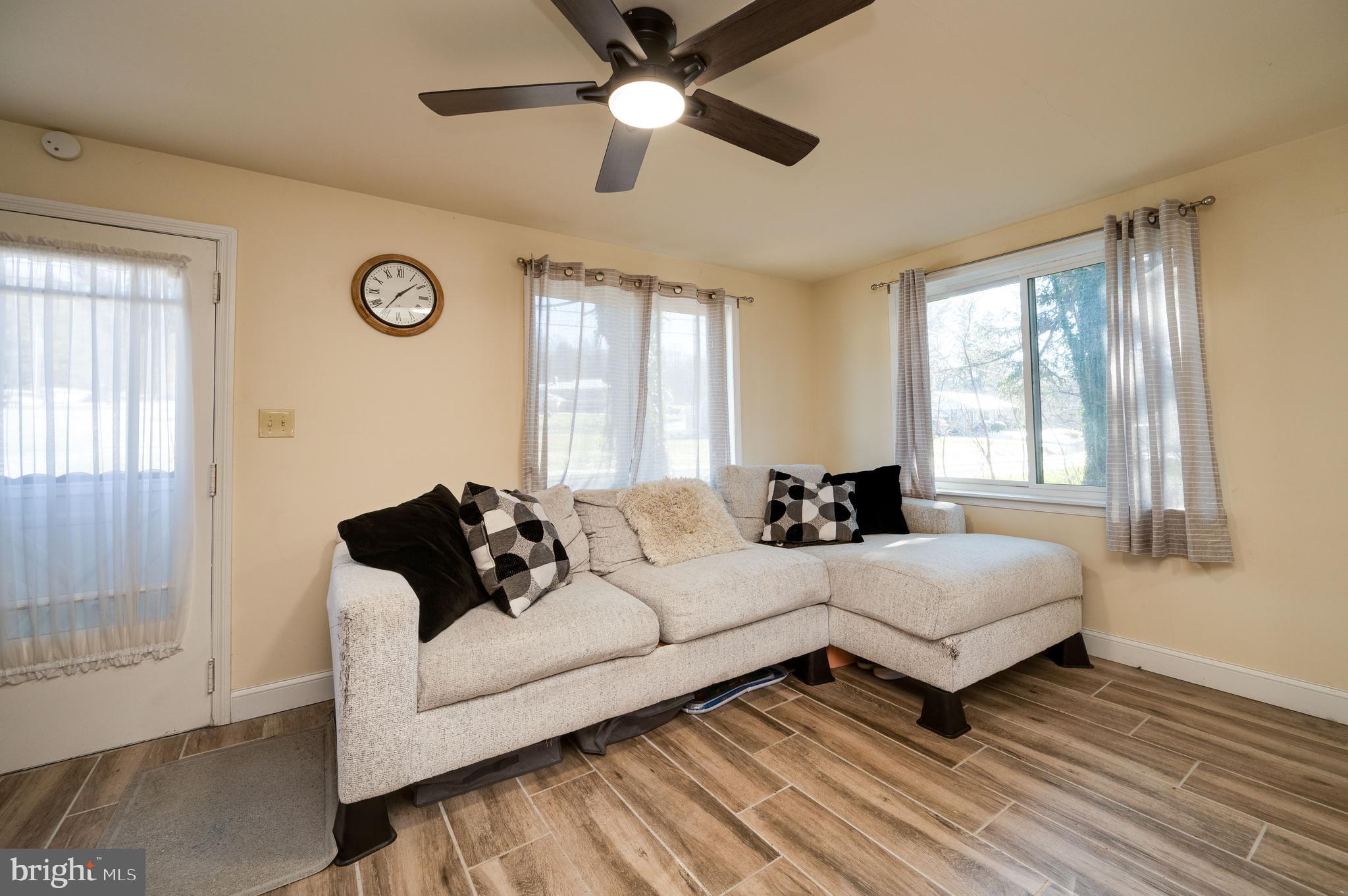175 Forgedale Road Fleetwood, PA 19522 - Photo 3 of 42 a living room with furniture and a large window