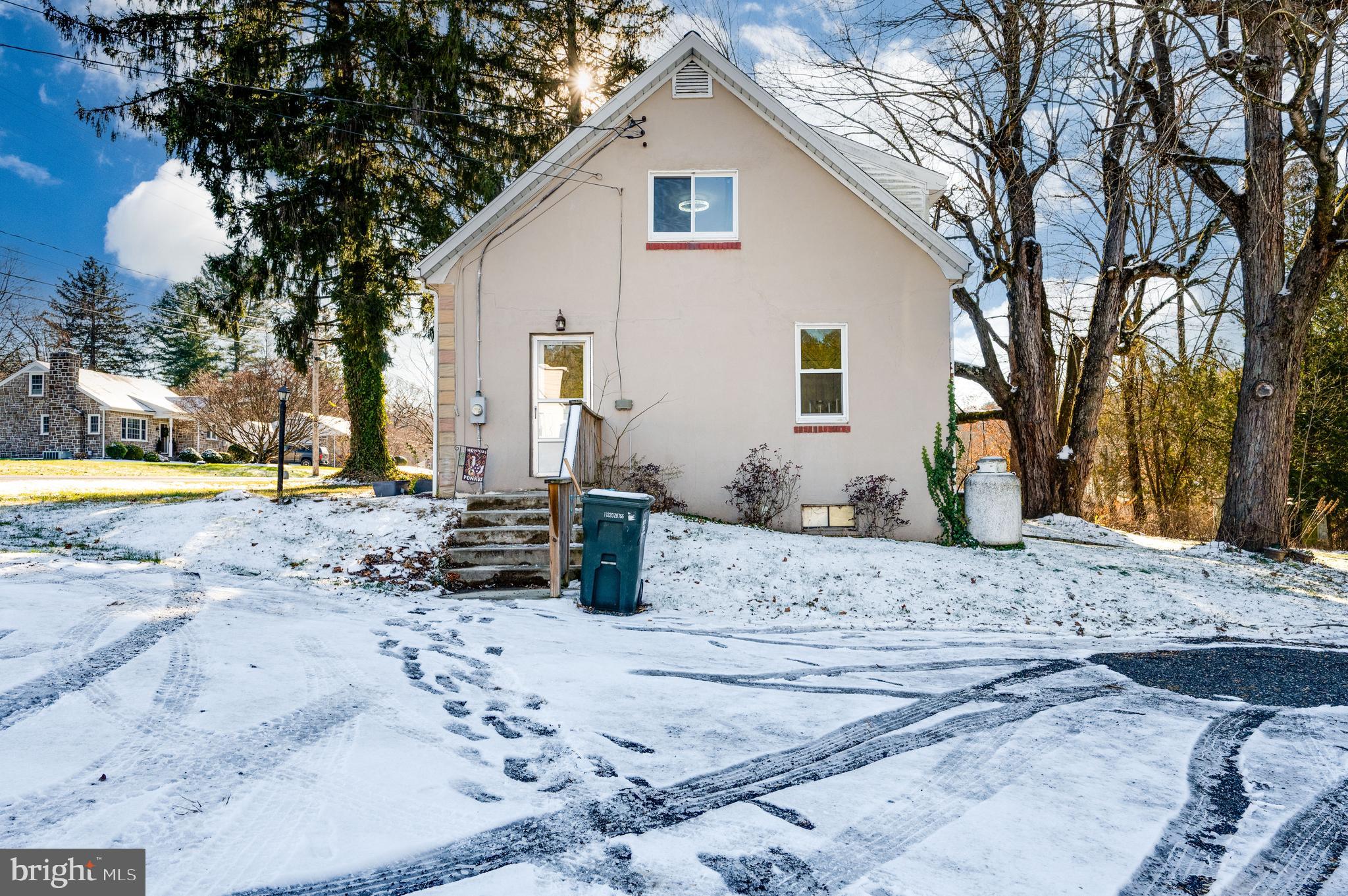 175 Forgedale Road Fleetwood, PA 19522 - Photo 33 of 42 a view of a house with snow on the side of the road