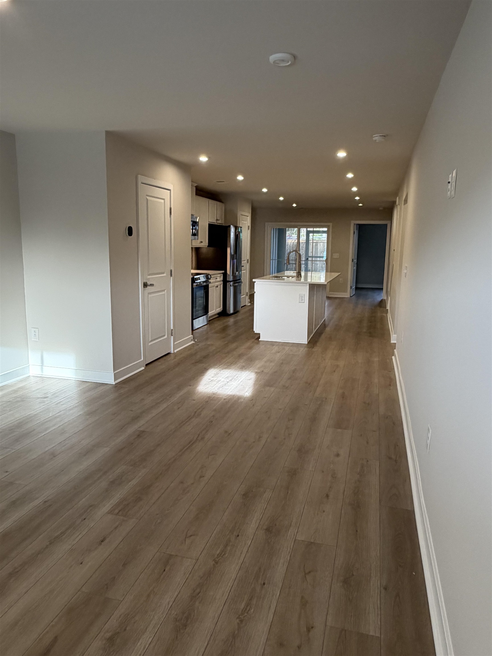 1303 Pleasant View Drive, Unit B North Myrtle Beach, SC 29582 - Photo 2 of 13 Unfurnished living room with recessed lighting and light wood-style flooring