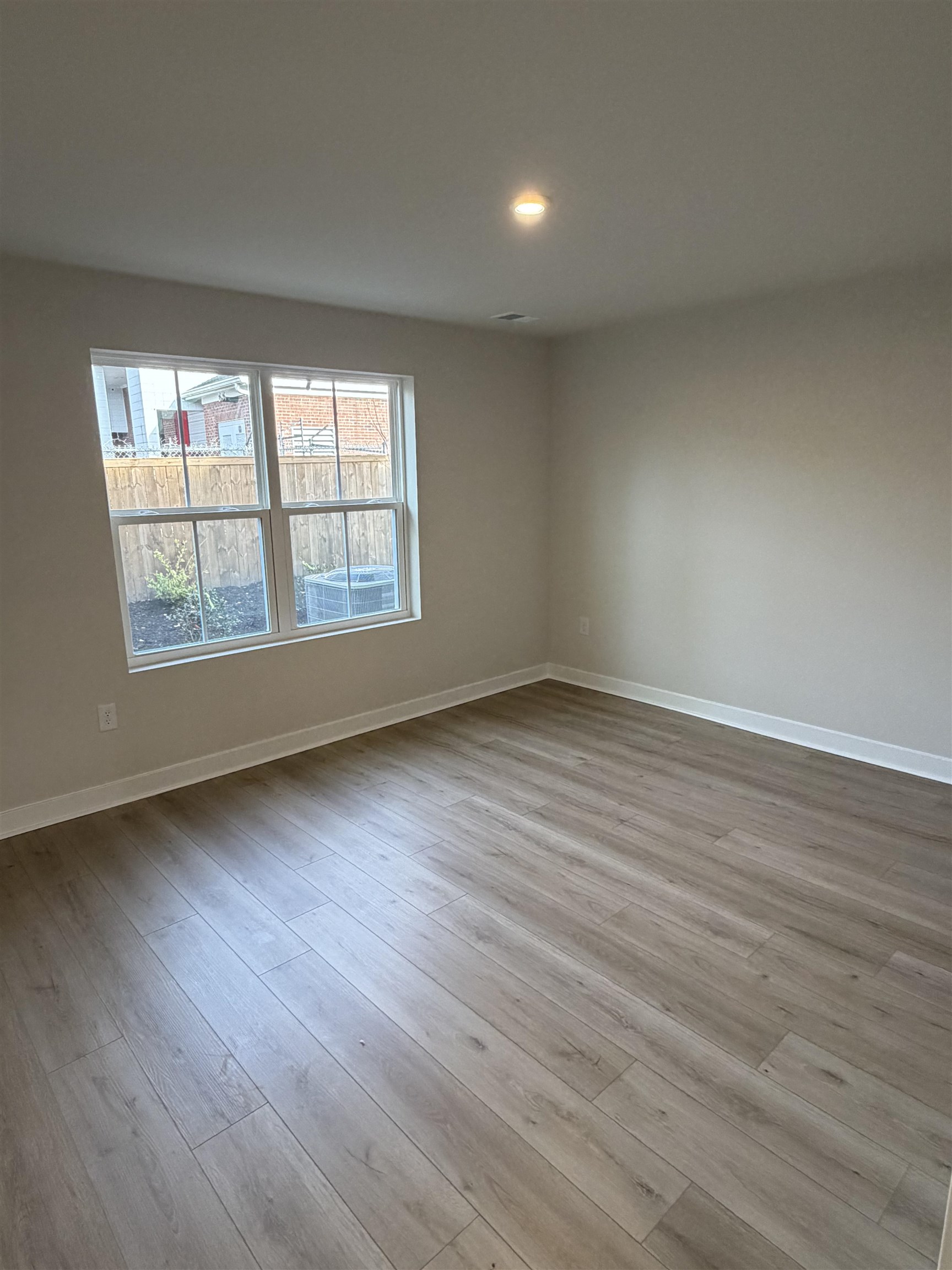1303 Pleasant View Drive, Unit B North Myrtle Beach, SC 29582 - Photo 5 of 13 Empty room featuring light wood-style flooring and recessed lighting