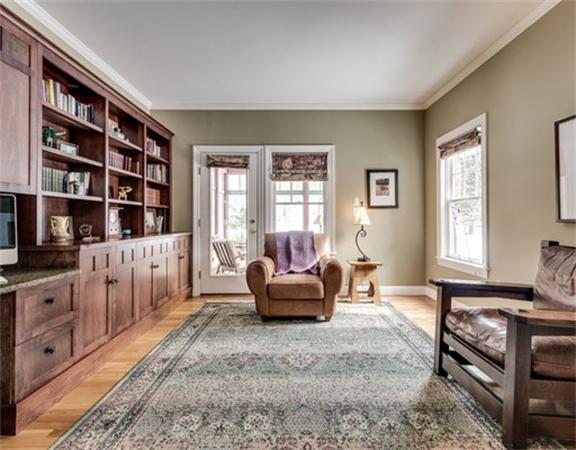 5 Granville Road Lincoln, MA 01773 - Photo 15 of 30 a living room with furniture and a book shelf