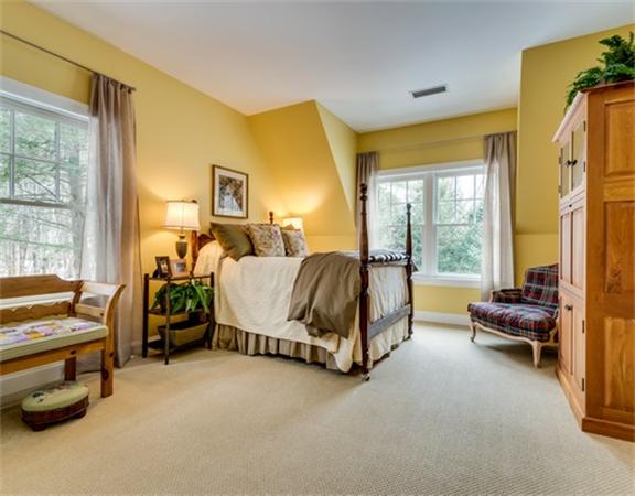 5 Granville Road Lincoln, MA 01773 - Photo 18 of 30 a bedroom with a bed and a window