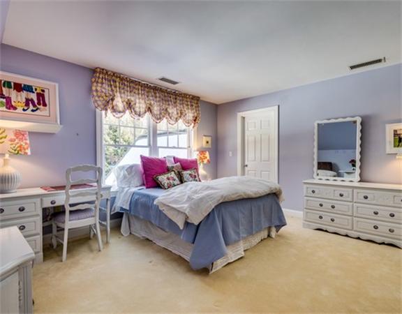 5 Granville Road Lincoln, MA 01773 - Photo 23 of 30 a bedroom with a bed chair and dresser