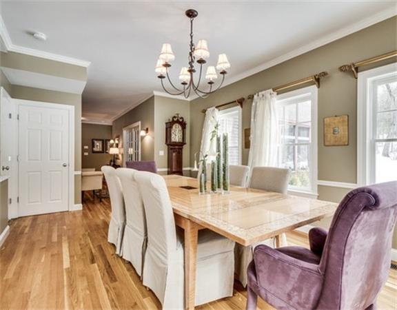 5 Granville Road Lincoln, MA 01773 - Photo 6 of 30 a view of a dining room with furniture a chandelier and wooden floor