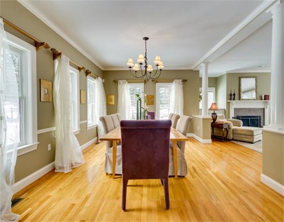 5 Granville Road Lincoln, MA 01773 - Photo 7 of 30 a living room with furniture dining table and a fireplace