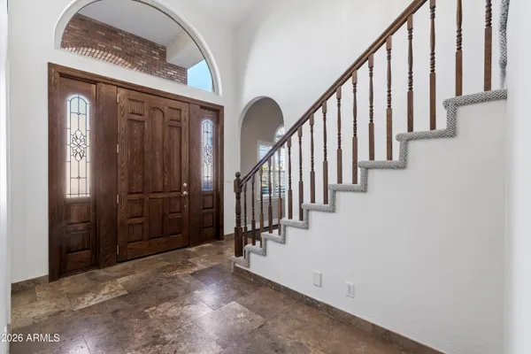 a media room with lots of chairs and a projector screen