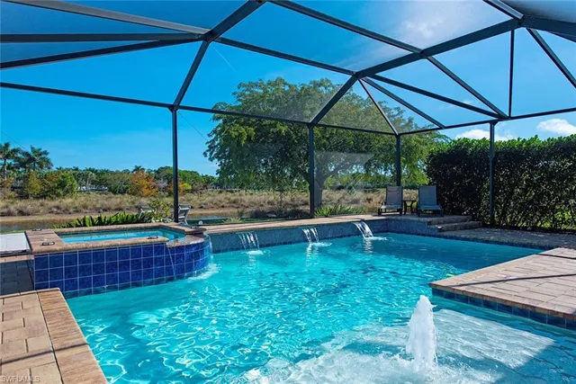 a view of a swimming pool with a patio