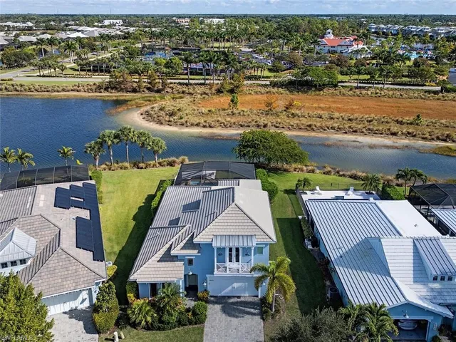 an aerial view of a house with outdoor space