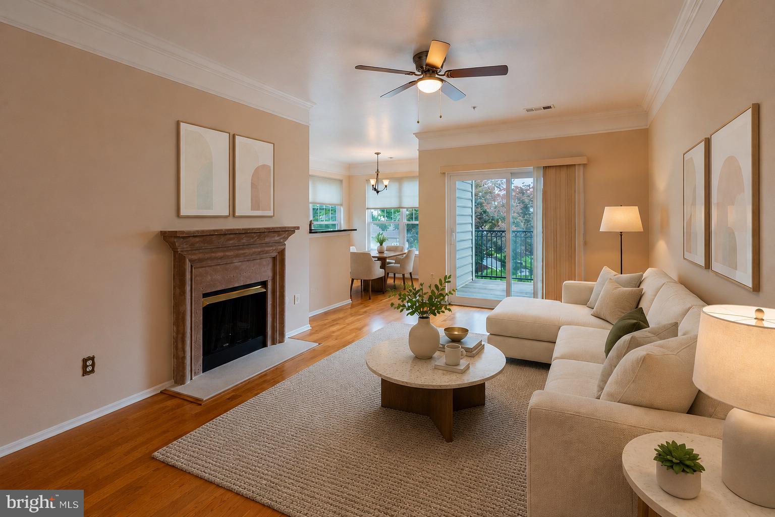 1600 Spring Gate Dr., Unit 2207 McLean, VA 22102 - Photo 5 of 32 a living room with furniture and a fireplace