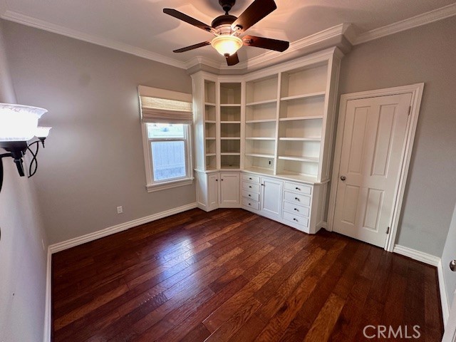 519 East Stuart Avenue Redlands, CA 92374 - Photo 12 of 36 a view of an empty room with wooden floor and a window