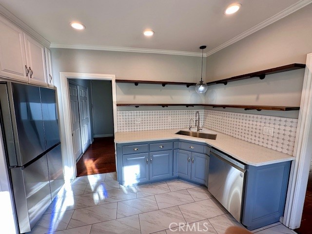 519 East Stuart Avenue Redlands, CA 92374 - Photo 20 of 36 a kitchen with stainless steel appliances granite countertop a sink and cabinets